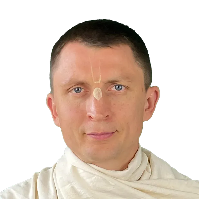 Vraja Gopal Das in a white chadar, wearing Vaishnava tilaka
